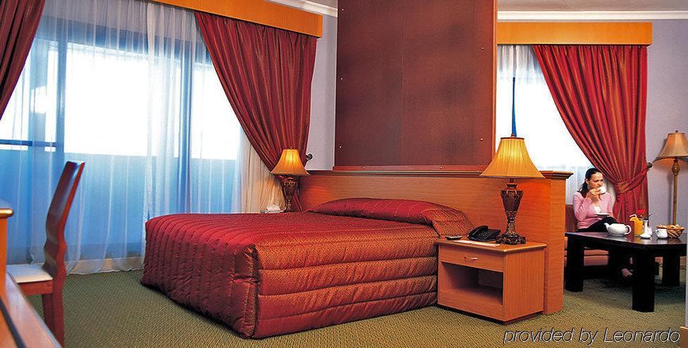 فندق Coral Oriental دبي الغرفة الصورة