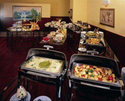 فندق Coral Oriental دبي المطعم الصورة